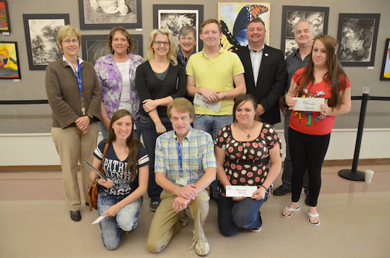 (From left) Dr. Kristen Westover, Karen Conner, Jess Edwards, Dr. Angeline Godwin, Joshua Amos, Christopher Parker, Gerry Bannan and Ashley Chaney. Pictured on the front row are Briana Amos, John Christian and Courtney Baity